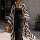 Woman wearing a black and white striped kimono (Black)