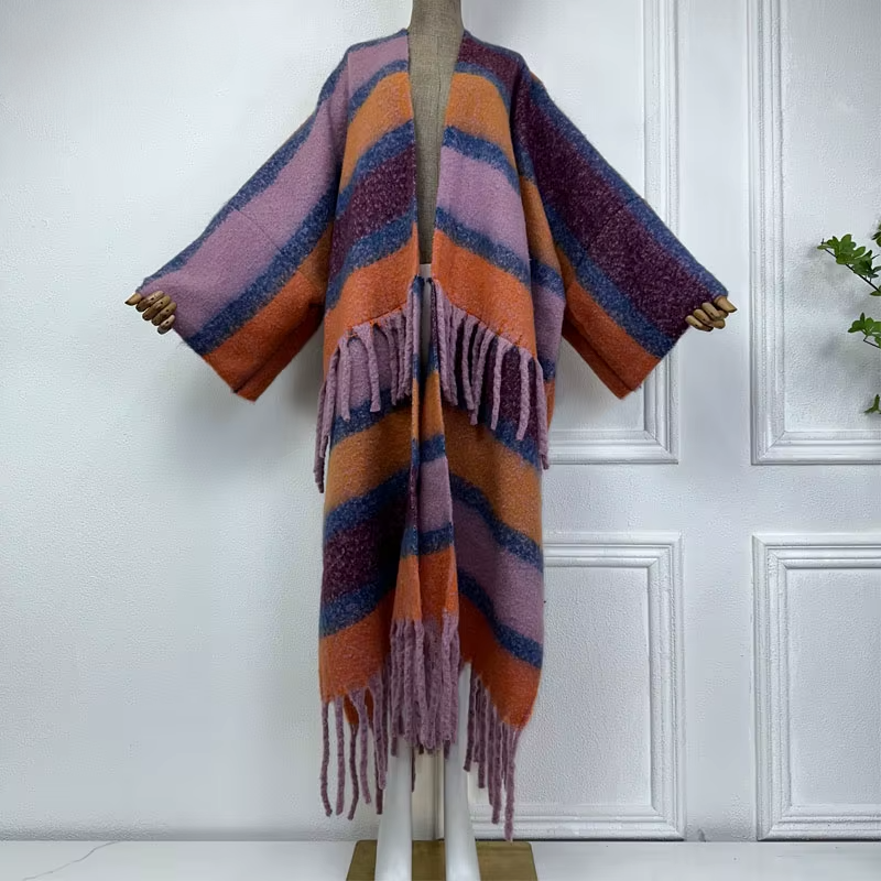 A wool cardigan kimono with striped patterns and fringes displayed on a mannequin against a white background. (Purple)