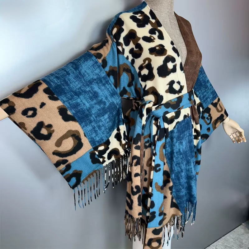 Leopard print and blue patterned scarf on a mannequin against a plain background (Blue)