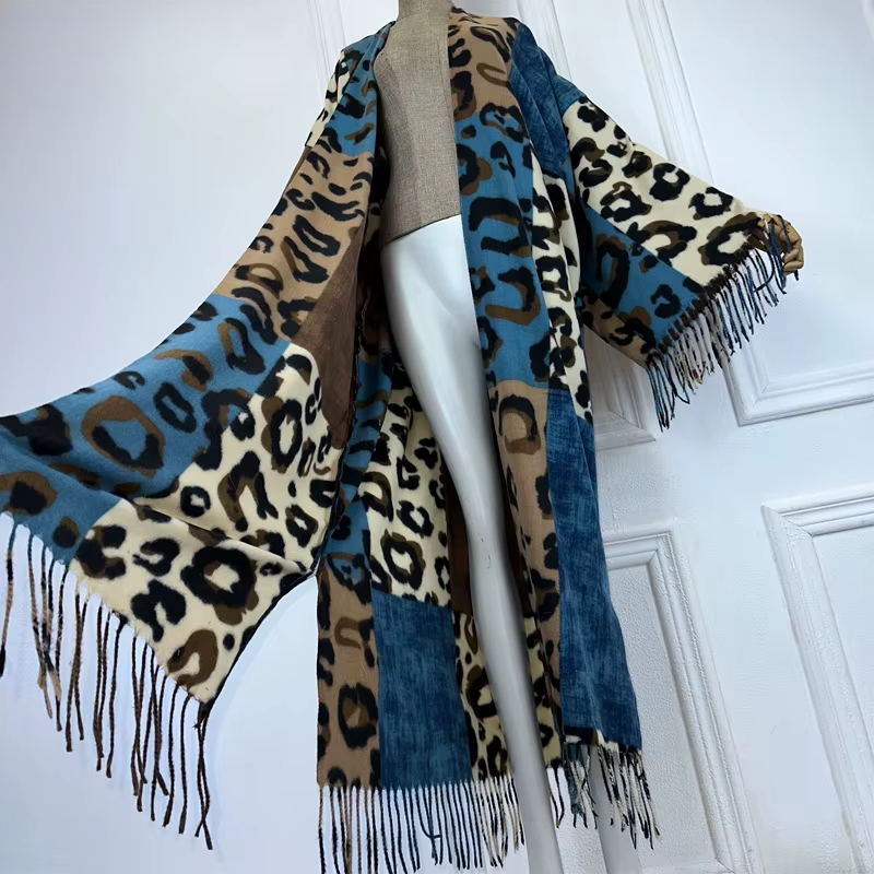 Leopard print scarf with blue accents draped over a mannequin against a white background (Blue)