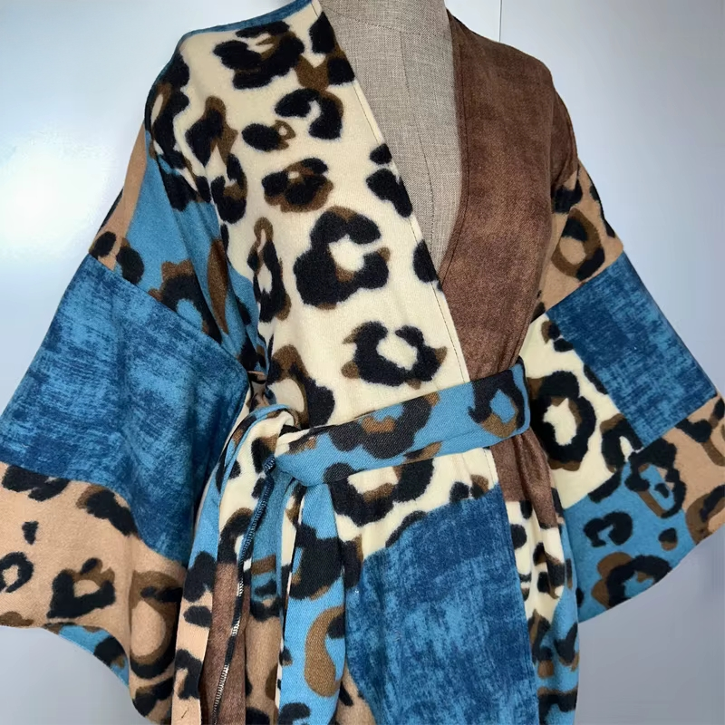 Leopard print robe with blue accents on a mannequin against a white background (Blue)