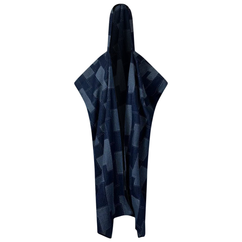 A hooded denim kimono with a geometric patchwork design in shades of blue and indigo, displayed in an open and draped position. (Dark Blue)