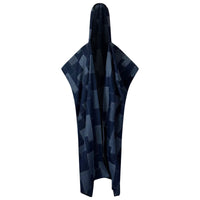 A hooded denim kimono with a geometric patchwork design in shades of blue and indigo, displayed in an open and draped position. (Dark Blue)