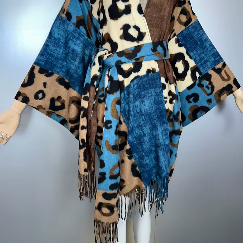 Scarf with leopard print and blue patches on a mannequin against a light gray background (Blue)