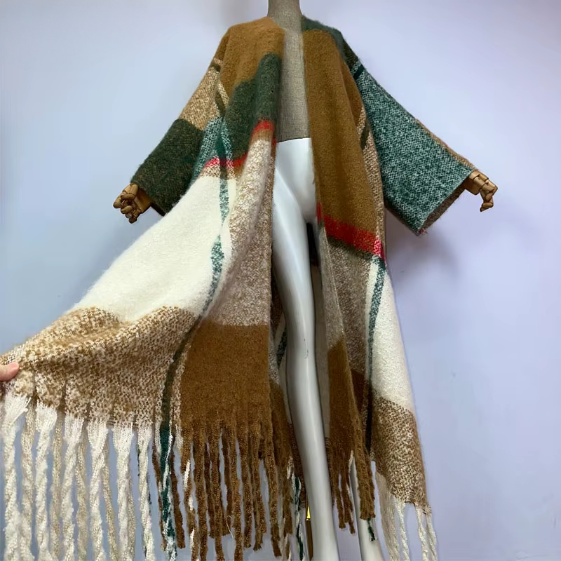 Plaid patterned shawl with fringes on a mannequin against a plain background (Brown)