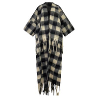 Black and white checkered poncho with fringes on a white background (Black)