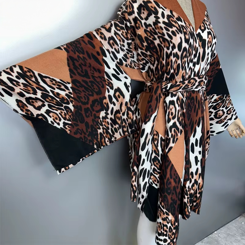 Leopard print dress with a belt on a mannequin against a gray background (Brown)