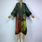 A wool kimono with a paisley pattern in multicolor displayed on a mannequin. (Green)