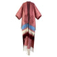 Red poncho with colorful stripes and fringes on a white background (Pink)