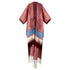 Red poncho with colorful stripes and fringes on a white background (Pink)